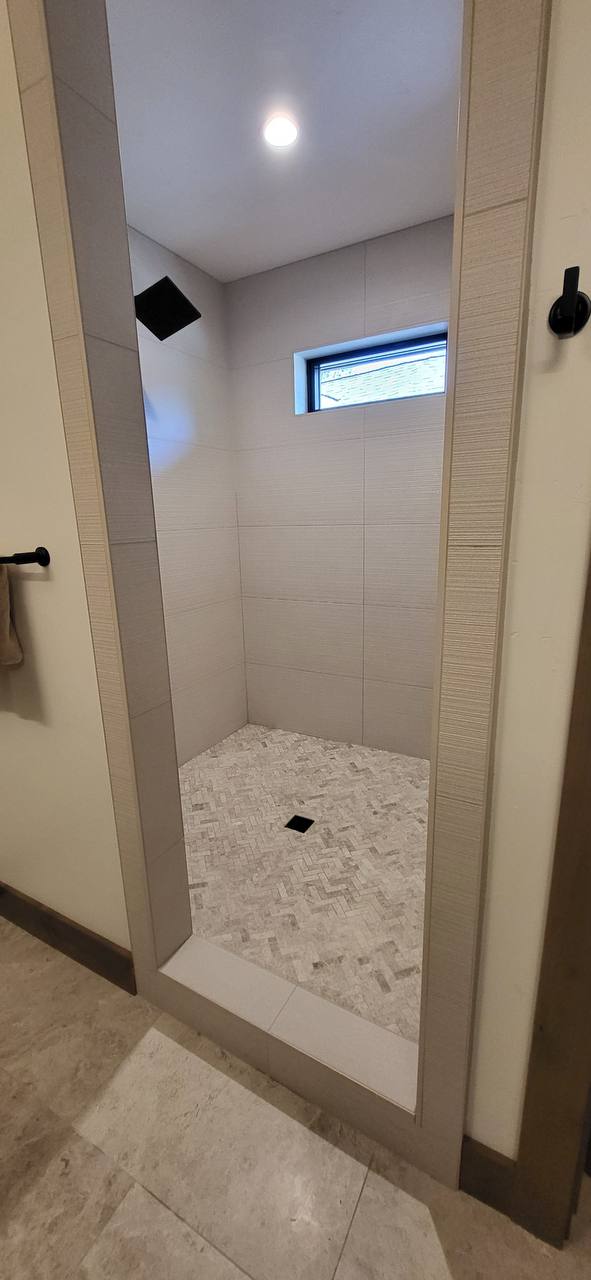 Herringbone shower entry detail